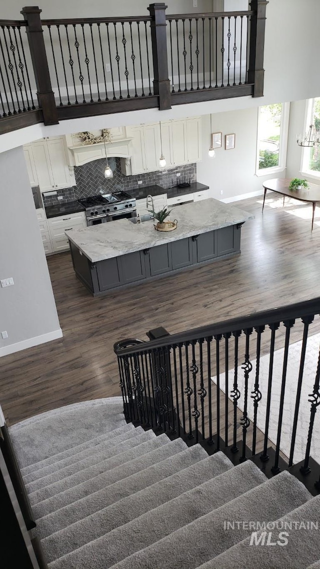2527 E Taormina Dr, Meridian, ID 83642 - stairway with wood finished floors and baseboards