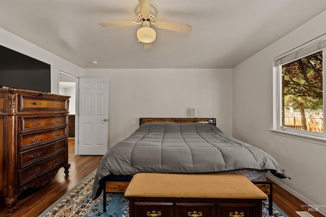 510 Shady Grove Way, Kuna, ID 83634 - bedroom featuring dark wood-type flooring, a ceiling fan, and baseboards