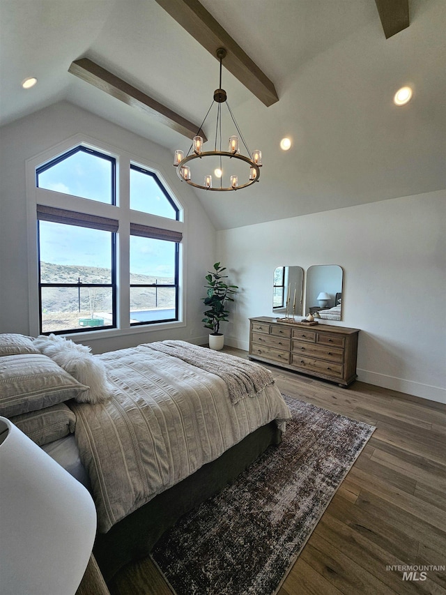bedroom featuring recessed lighting, lofted ceiling with beams, wood finished floors, baseboards, and a notable chandelier