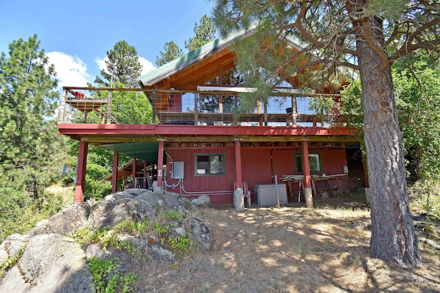 view of front of house with a wooden deck