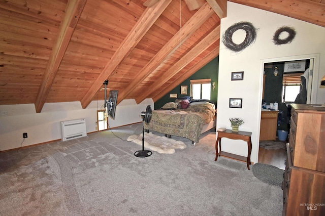 carpeted bedroom with heating unit, lofted ceiling with beams, ensuite bath, and wood ceiling