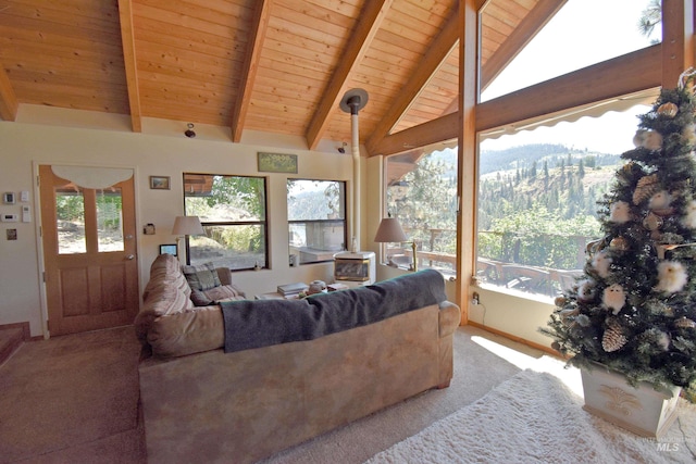 carpeted living room with beam ceiling, high vaulted ceiling, and wooden ceiling