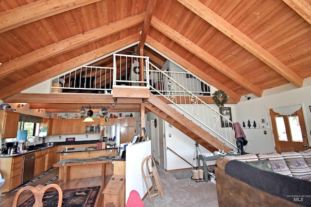 living room featuring carpet, wooden ceiling, high vaulted ceiling, sink, and beam ceiling