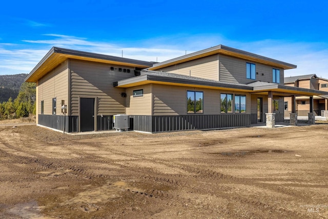 13156 Hawks Bay, Donnelly, ID 83615 - back of property featuring central AC
