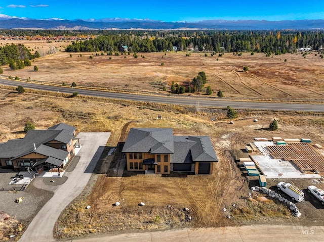 13156 Hawks Bay, Donnelly, ID 83615 - aerial view of sparsely populated area featuring a mountain backdrop