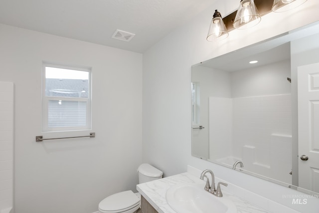 full bathroom featuring toilet, vanity, and plus walk in shower