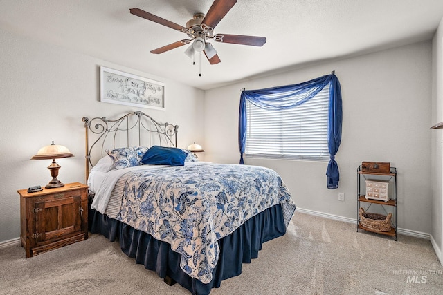 bedroom featuring baseboards, carpet, and ceiling fan