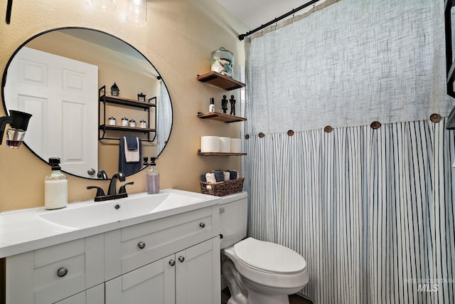 full bath with vanity, a shower with shower curtain, and toilet