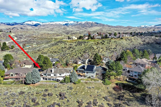 aerial view with a residential view and a mountain view