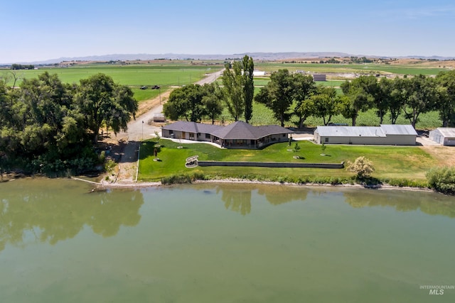 aerial view with a water view and a rural view