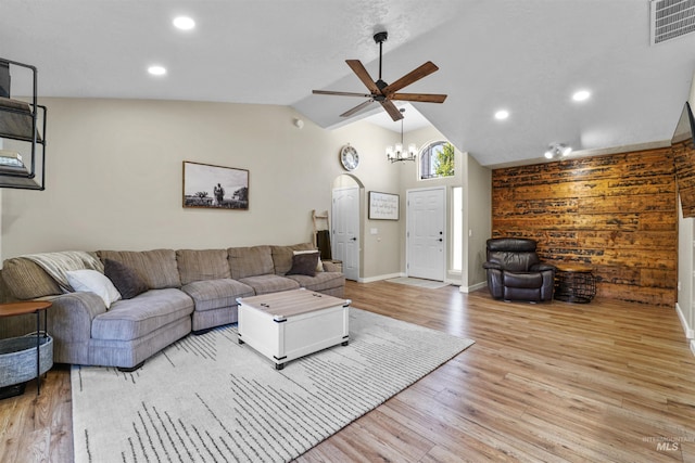 8116 Waterleaf Ave, Nampa, ID 83687 - living room with a ceiling fan, light wood finished floors, vaulted ceiling, baseboards, and recessed lighting