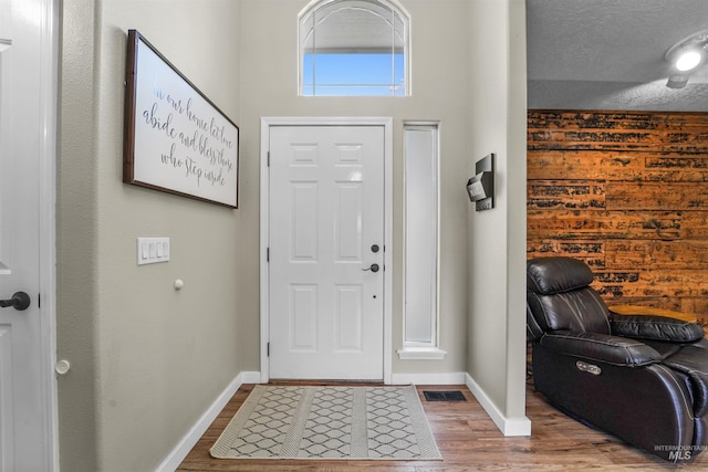 8116 Waterleaf Ave, Nampa, ID 83687 - foyer with wood finished floors and baseboards