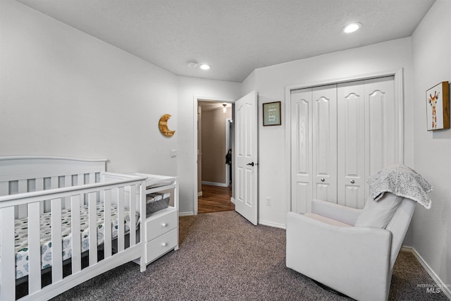 8116 Waterleaf Ave, Nampa, ID 83687 - bedroom featuring dark colored carpet, a closet, recessed lighting, and baseboards