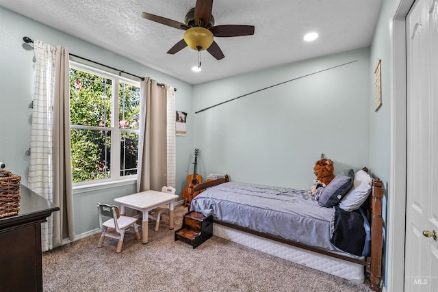 8116 Waterleaf Ave, Nampa, ID 83687 - bedroom featuring carpet flooring, a ceiling fan, a textured ceiling, recessed lighting, and baseboards
