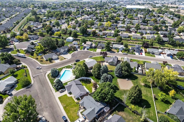 8116 Waterleaf Ave, Nampa, ID 83687 - aerial view of property's location with a pool area and nearby suburban area