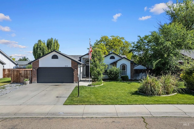 8116 Waterleaf Ave, Nampa, ID 83687 - ranch-style house with an attached garage, brick siding, and concrete driveway