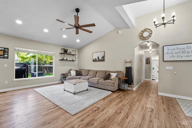 8116 Waterleaf Ave, Nampa, ID 83687 - living area featuring ceiling fan, arched walkways, light wood-style flooring, recessed lighting, and baseboards