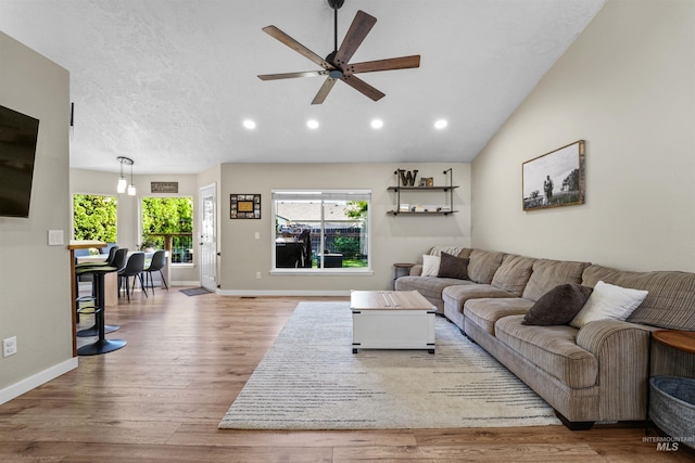 8116 Waterleaf Ave, Nampa, ID 83687 - living area with ceiling fan, wood finished floors, recessed lighting, baseboards, and lofted ceiling