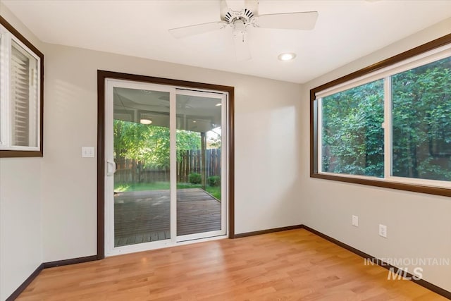 6917 W Randolph Dr, Boise, ID 83709 - unfurnished room featuring healthy amount of natural light, baseboards, light wood-style floors, ceiling fan, and recessed lighting