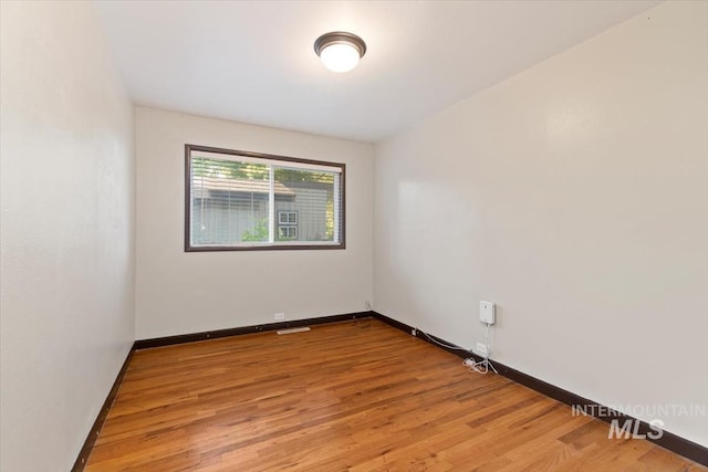 6917 W Randolph Dr, Boise, ID 83709 - spare room with light wood-style flooring and baseboards