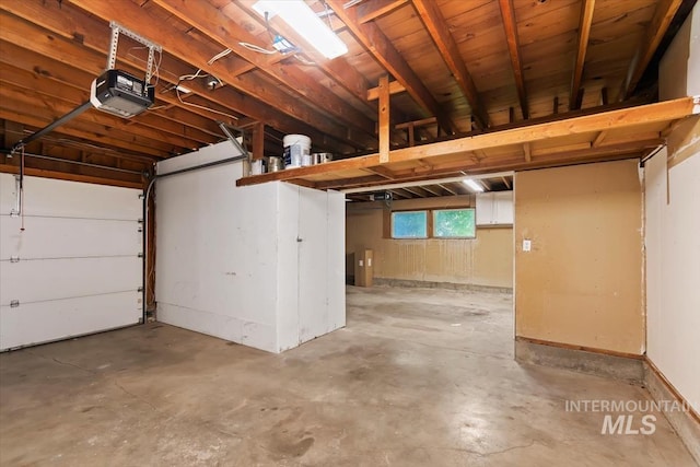 6917 W Randolph Dr, Boise, ID 83709 - garage featuring a garage door opener
