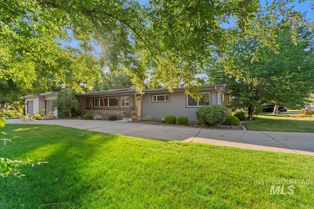 6917 W Randolph Dr, Boise, ID 83709 - ranch-style house featuring a front yard