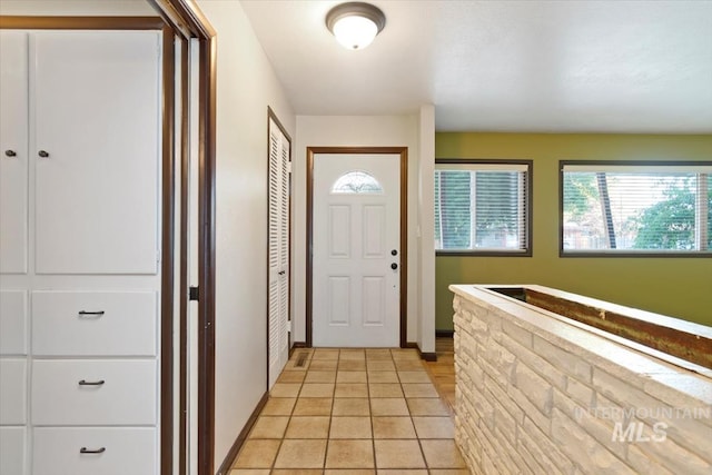 6917 W Randolph Dr, Boise, ID 83709 - foyer featuring light tile patterned floors