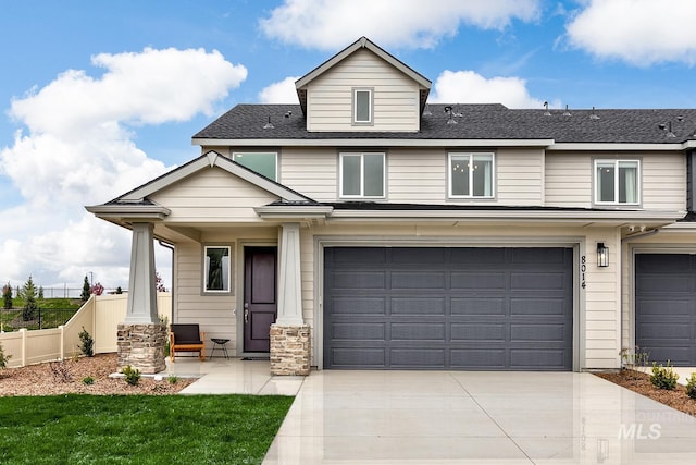 8014 W Fern St, Eagle, ID 83616 - view of front of home featuring driveway, a garage, a porch, and roof with shingles