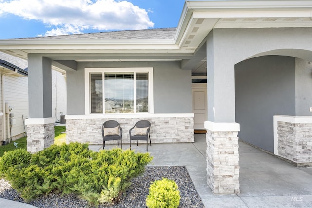 421 S Curtis Unit 128, Boise, ID 83705 - doorway to property featuring stucco siding and stone siding