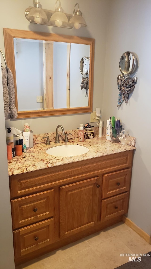 bathroom featuring vanity and tile patterned floors