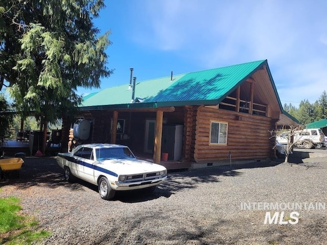 view of log cabin