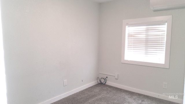 3377 W Nez Perce St, Boise, ID 83705 - empty room featuring a wall mounted air conditioner, carpet floors, and baseboards