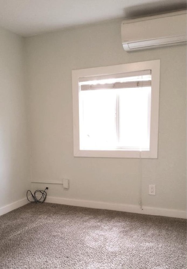 3377 W Nez Perce St, Boise, ID 83705 - carpeted spare room with baseboards and a wall mounted AC
