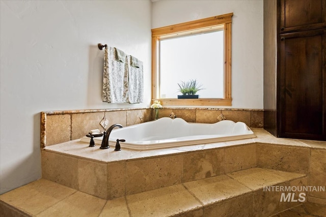 full bath featuring a bath