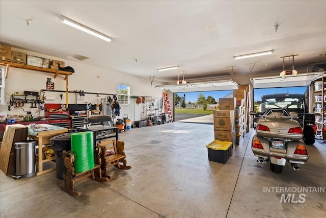 garage featuring a garage door opener