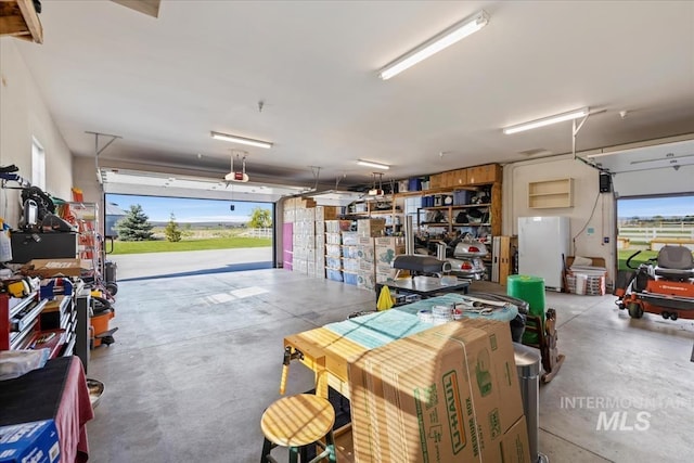 garage with freestanding refrigerator