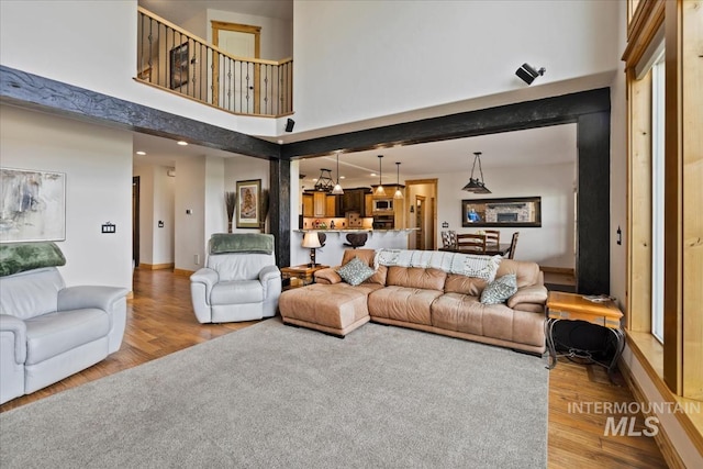 living area with wood finished floors