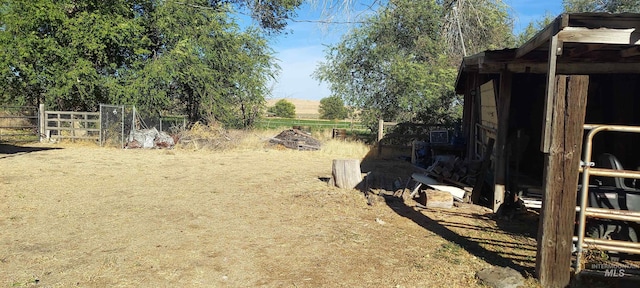 view of yard with an outdoor structure