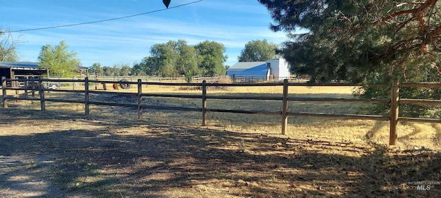 view of yard featuring a rural view