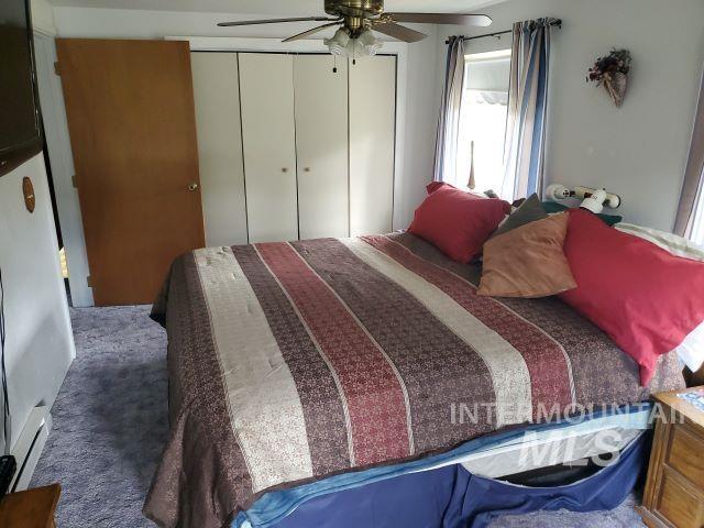 3460 American River Rd, Elk City, ID 83525 - bedroom with ceiling fan and a closet
