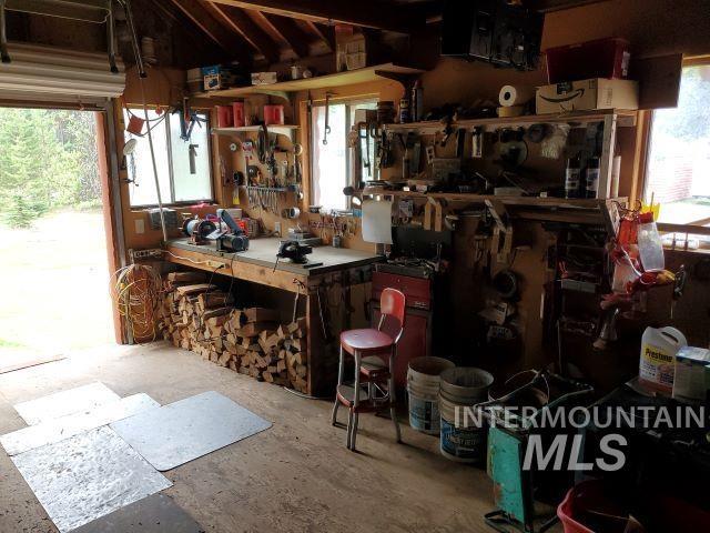 3460 American River Rd, Elk City, ID 83525 - garage featuring a workshop area