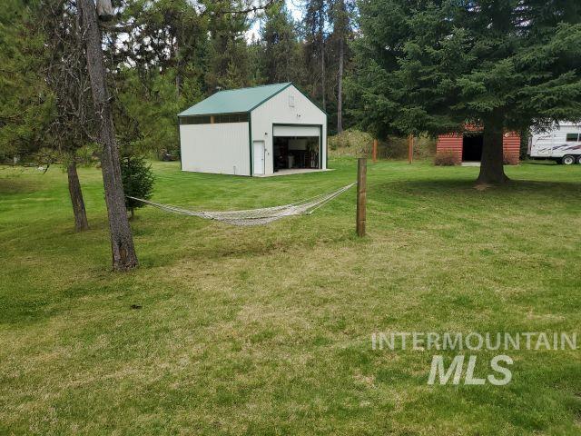 3460 American River Rd, Elk City, ID 83525 - view of yard with a garage and an outbuilding