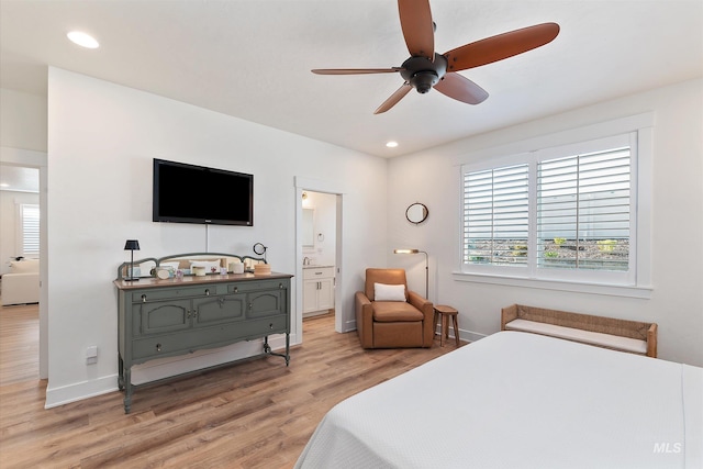 6009 W Riva Capri St, Meridian, ID 83646 - bedroom featuring recessed lighting, baseboards, connected bathroom, and light wood-type flooring