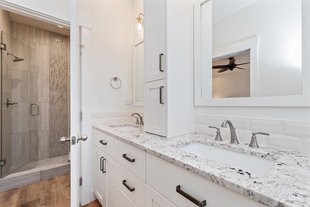 6009 W Riva Capri St, Meridian, ID 83646 - full bath featuring a shower stall, a ceiling fan, and a sink