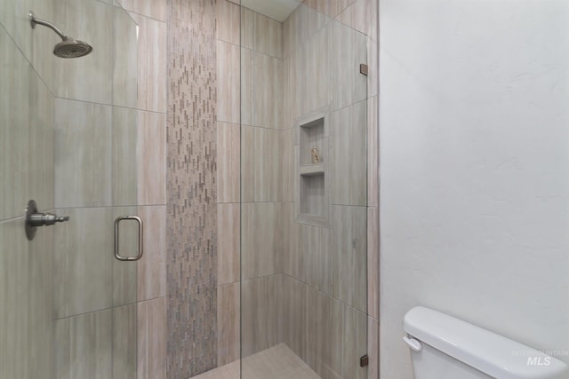 6009 W Riva Capri St, Meridian, ID 83646 - bathroom featuring a shower stall and toilet