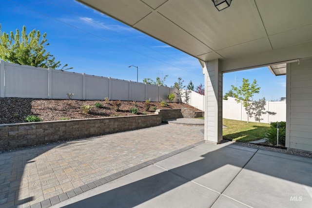 6009 W Riva Capri St, Meridian, ID 83646 - view of patio featuring a fenced backyard