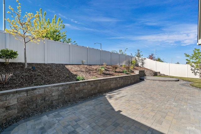 6009 W Riva Capri St, Meridian, ID 83646 - view of patio featuring a fenced backyard