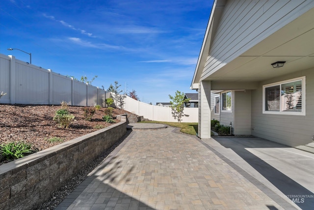 6009 W Riva Capri St, Meridian, ID 83646 - view of patio featuring a fenced backyard
