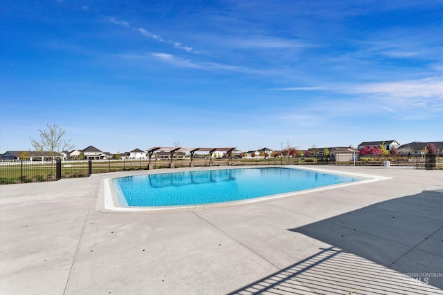 6009 W Riva Capri St, Meridian, ID 83646 - pool featuring fence, a residential view, and a patio