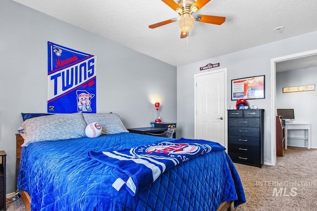 16042 N Saint Helens Dr, Nampa, ID 83651 - bedroom featuring carpet floors, a textured ceiling, a ceiling fan, and baseboards